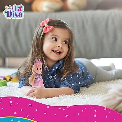 Happy little girl playing with preschool princess doll with accessories on a soft carpet