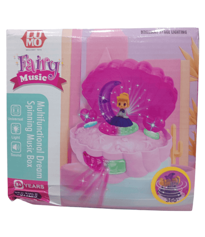 Pink battery operated musical light toy with a fairy that spins and plays music for ages 3 and up