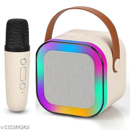 White machine karaoke speaker with colorful lights and wireless microphone for kids