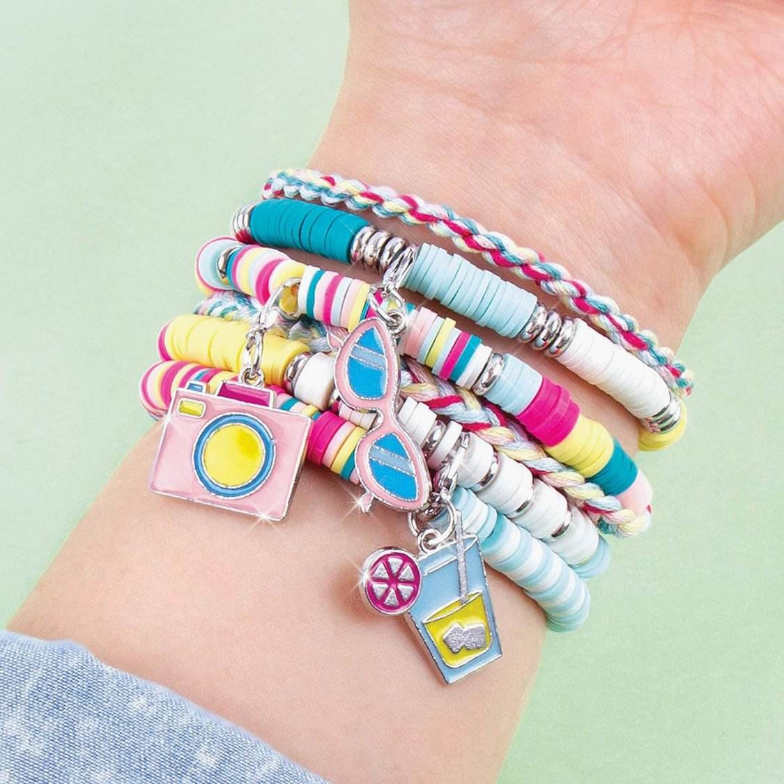 Colorful summer vibes bead bracelet kit with charms including camera, sunglasses, and drink on wrist