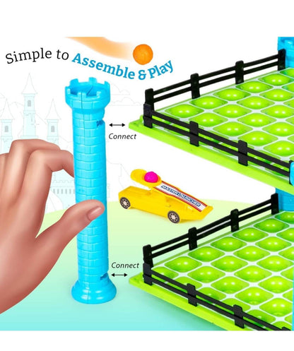 4 in a row launcher game for kids with blue tower, yellow launcher, and green game board with black fences
