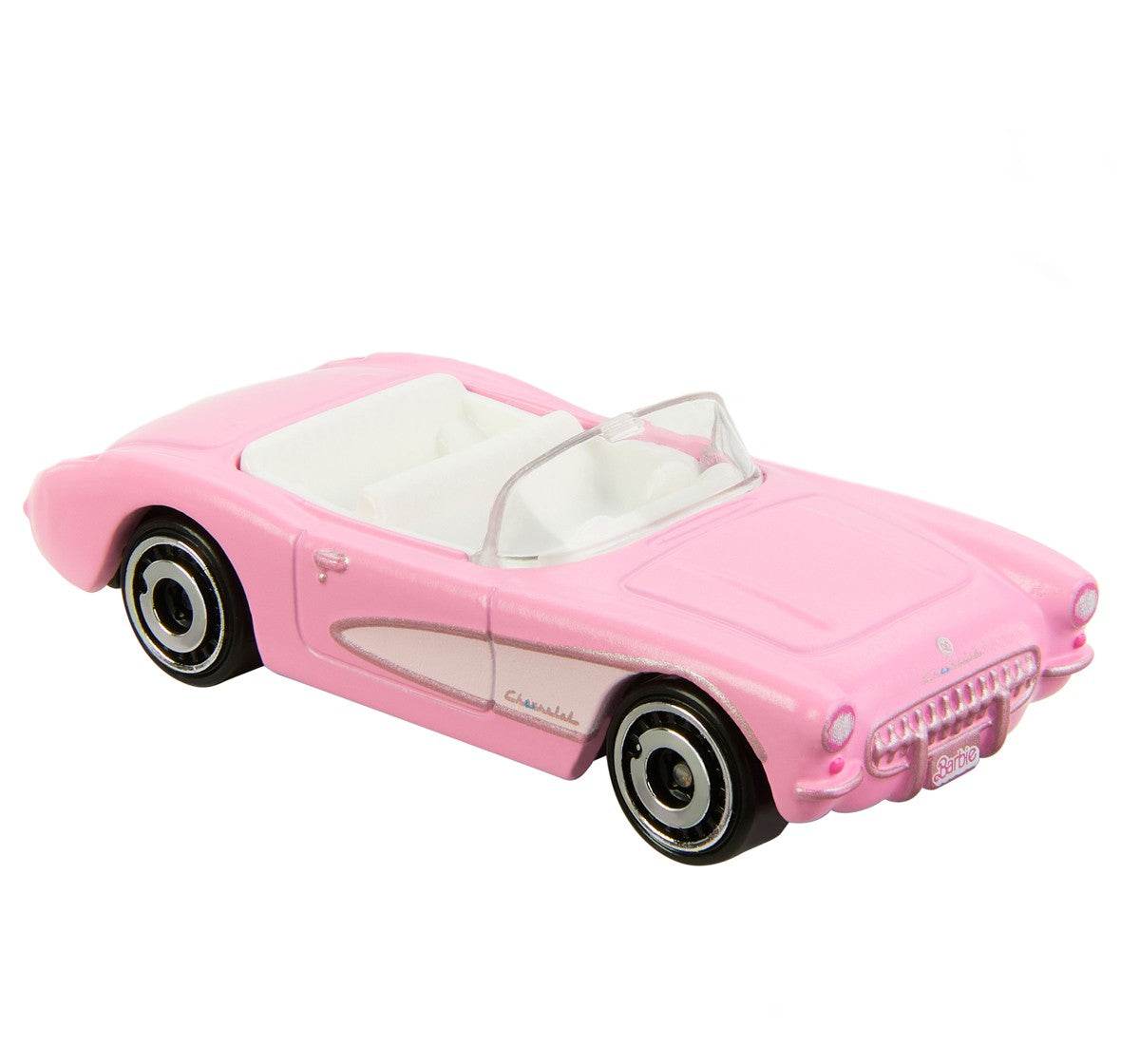 Pink Barbie Hot Wheels die-cast car convertible with white interior and detailed design
