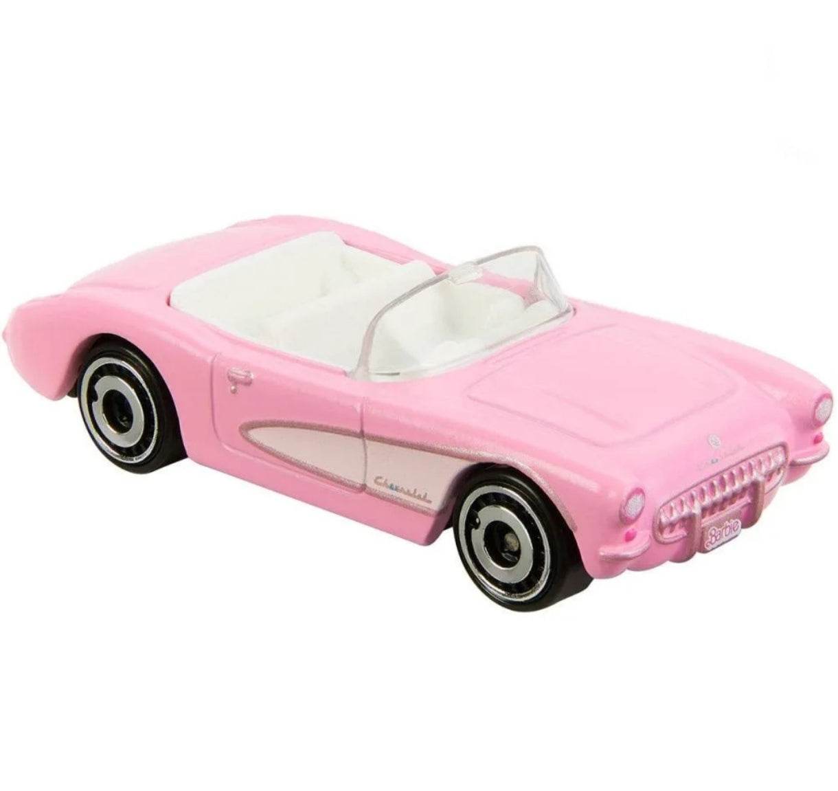 Pink Barbie Hot Wheels die-cast car convertible toy with white interior and detailed design