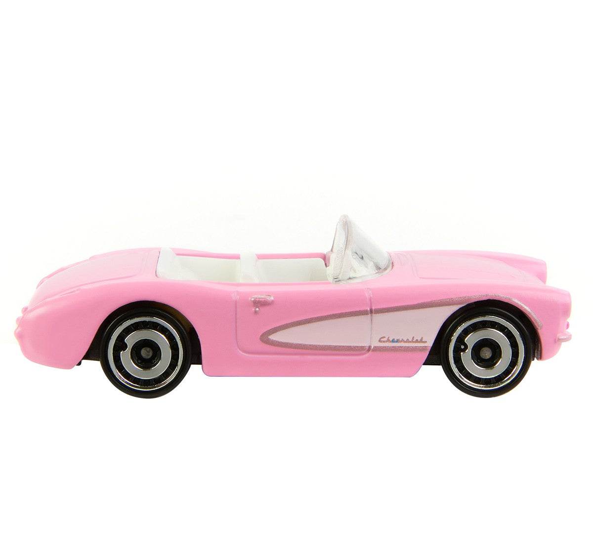 Pink Barbie Hot Wheels die-cast car convertible with white interior and detailed side design