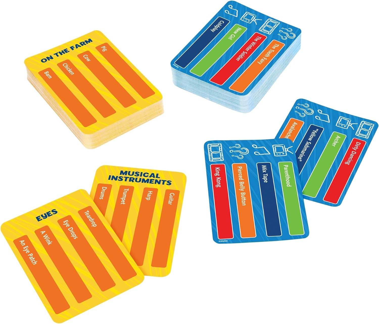 Piles of colorful Pictionary card game for adults featuring categories like musical instruments and farm items