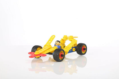Yellow plastic construction car toy with a driver figure and large black wheels on a white background