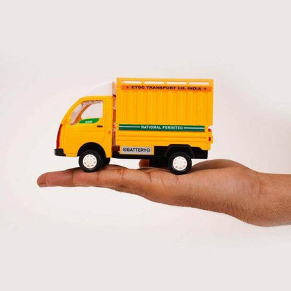 Yellow pull back mini truck toy held on hand from T-Rex the toyland Sitamarhi