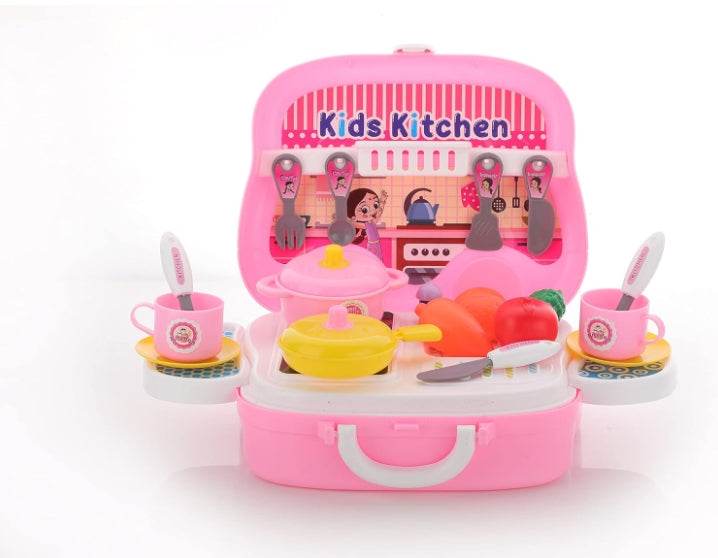 Pink modular kitchen toy set for kids with utensils cups pots and play vegetables in a suitcase design