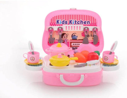 Pink modular kitchen toy set for kids with utensils cups pots and play vegetables in a suitcase design