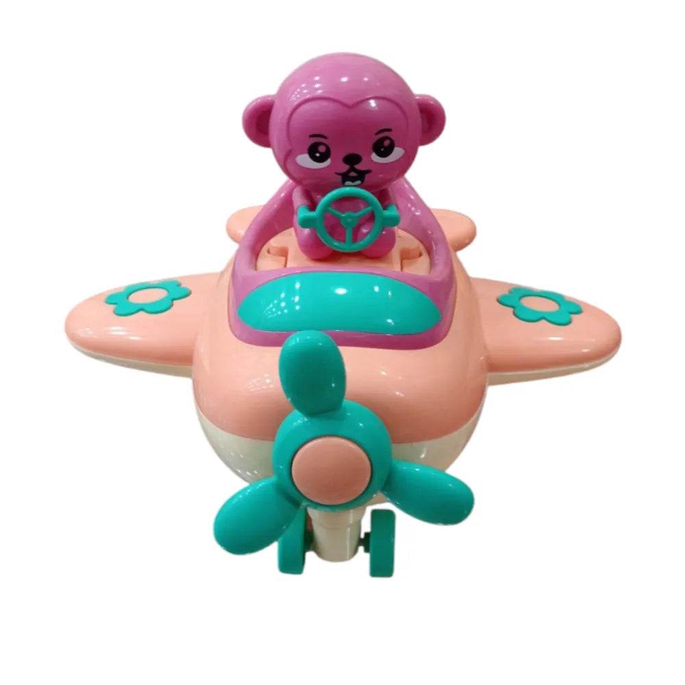 Pink and teal monkey pilot toy plane with a monkey character holding a steering wheel in a cartoon airplane