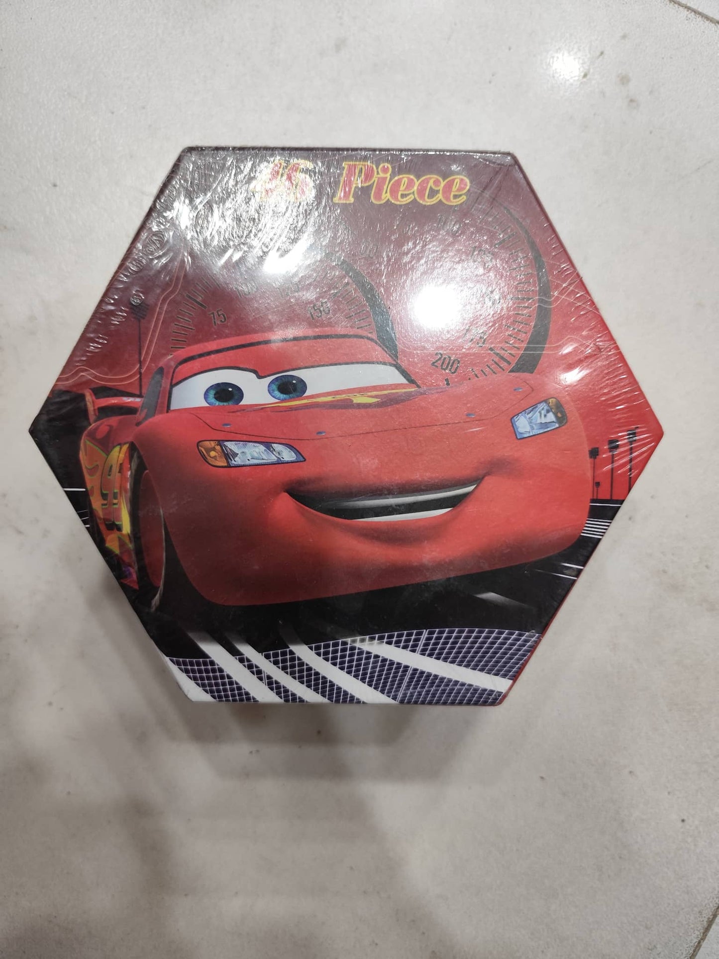 Colorful hexagonal box featuring Lightning McQueen for a fun nativity set drawing activity