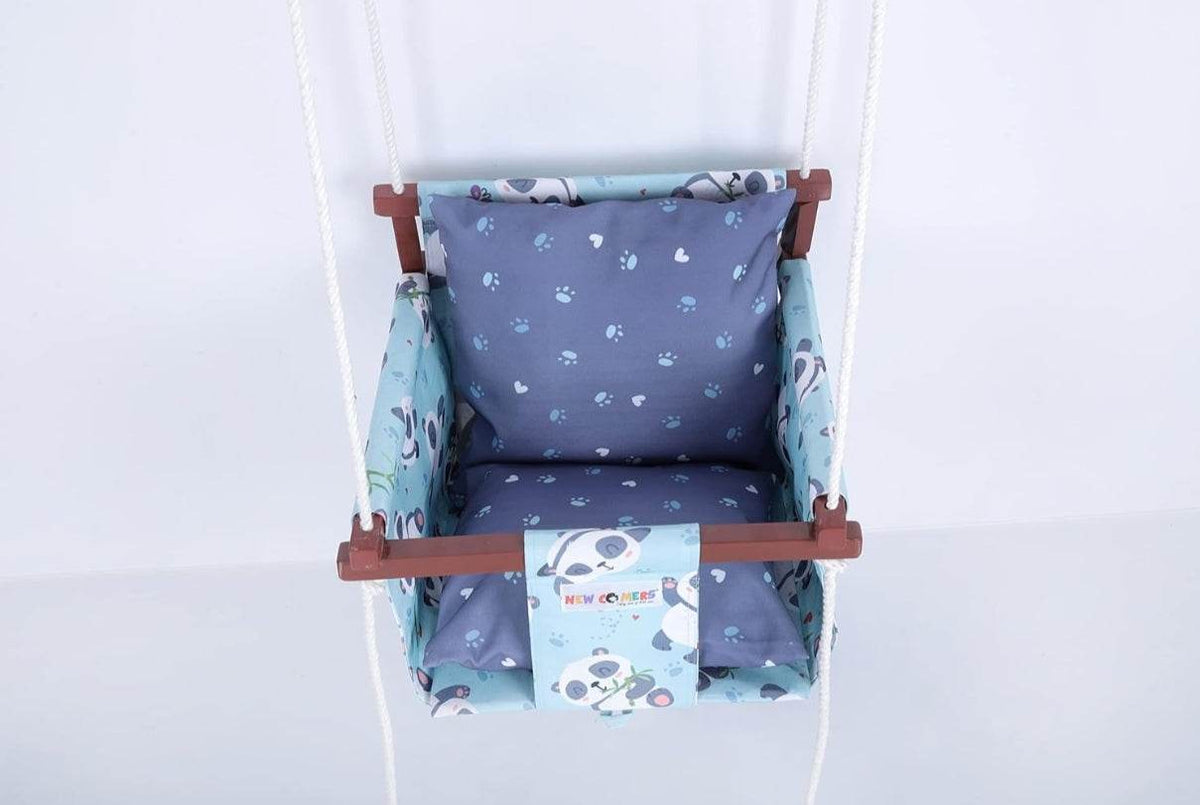Blue swing set for kids with panda design and soft cushions for comfort