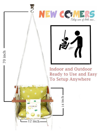 Indoor swing set for kids with green cushions, easy to set up anywhere for ages 2-5