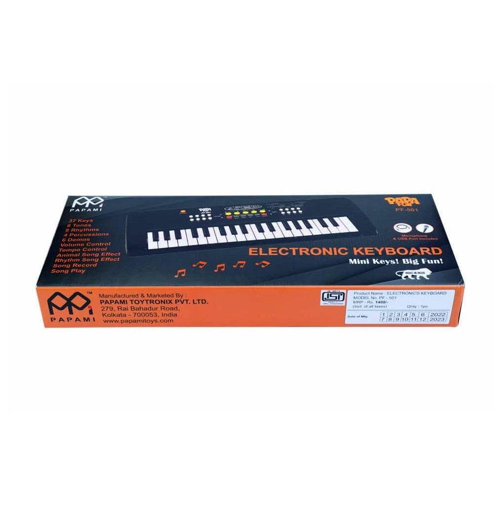 Kids electronic piano keyboard toy by T-Rex the toyland Sitamarhi in black and orange packaging