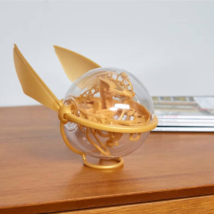Harry Potter Quidditch Snitch toy in gold with detailed design for fans of all ages