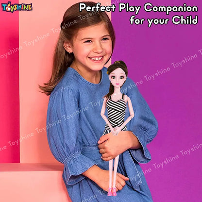 Doll in pink dress dresses held by a smiling girl wearing a blue denim dress