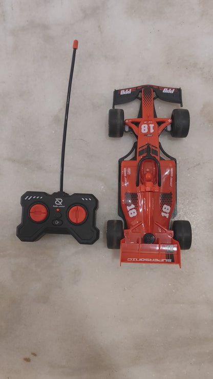 Drift GO Spray Racing Car – 1:18 Scale Formula F1 Design with LED Lights, Graphic Decals, High-Speed Performance & Quick Reflex Remote Control Car – for Kids Ages 6+