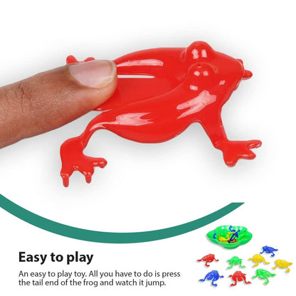 Red plastic frog being pressed to jump in the Jumping Frog board game for kids by T-Rex the toyland Sitamarhi