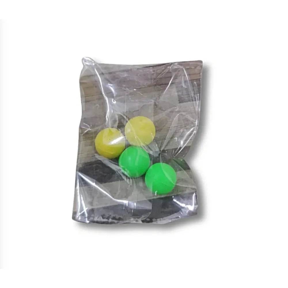 Set of yellow and green balls in clear plastic packaging for magic basketball toy for kids
