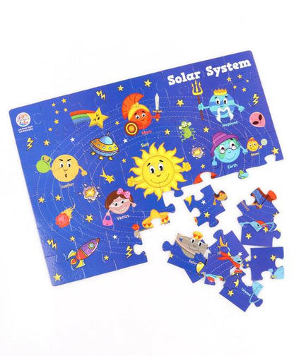Colorful solar system puzzle for kids featuring planets with cartoon faces and labeled names on a blue background