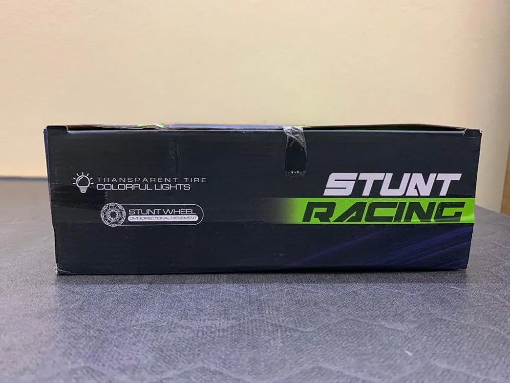 Black stunt racing remote control car with colorful lights and transparent tires for kids