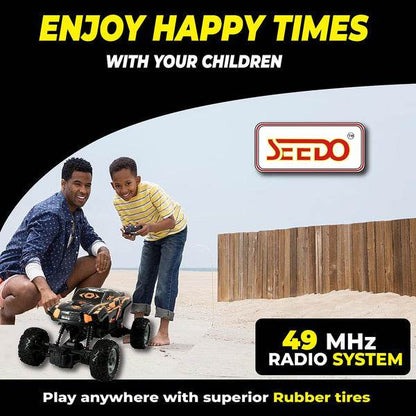Seedo rechargeable remote control monster truck with 49 MHz radio system and rubber tires played by father and son on sandy beach