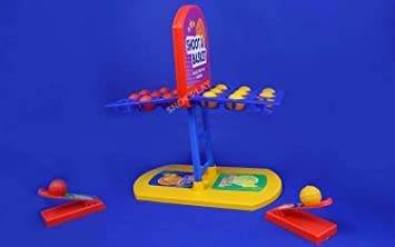 Shoot a basket game for kids with colorful hoops and balls on a blue and yellow stand
