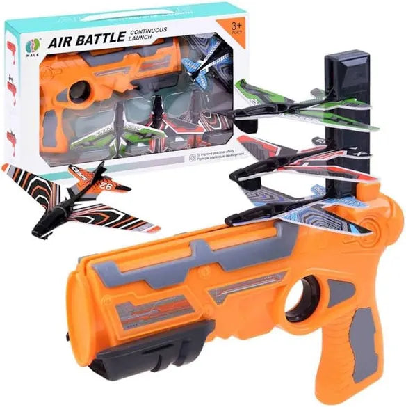 Toy air battle gun with launchers and packaging on a white background