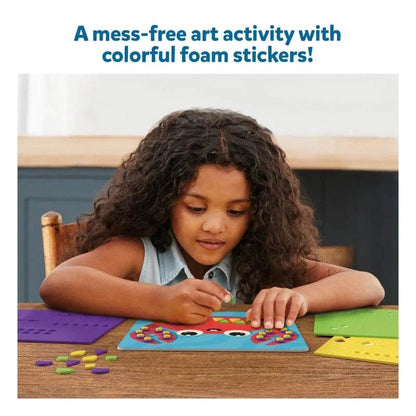 Child crafting colorful foam stickers with Skillmatics foam sticker ocean craft kit for mess-free art fun