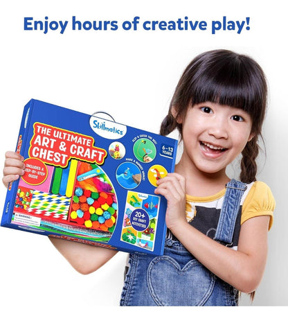 Smiling girl holding the Ultimate art and craft kit for kids with colorful materials and activity guide