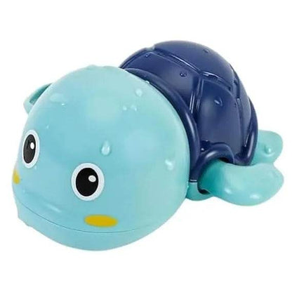 Blue and navy swimming turtle bath toy for toddlers with large eyes and a smiling face
