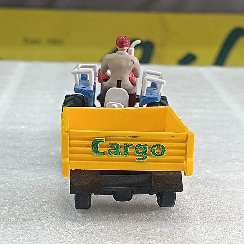 Yellow cargo tractor toy with trolley featuring a seated driver figure from T-Rex the toyland Sitamarhi