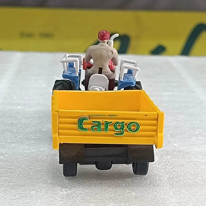 Yellow cargo tractor toy with trolley featuring a seated driver figure from T-Rex the toyland Sitamarhi