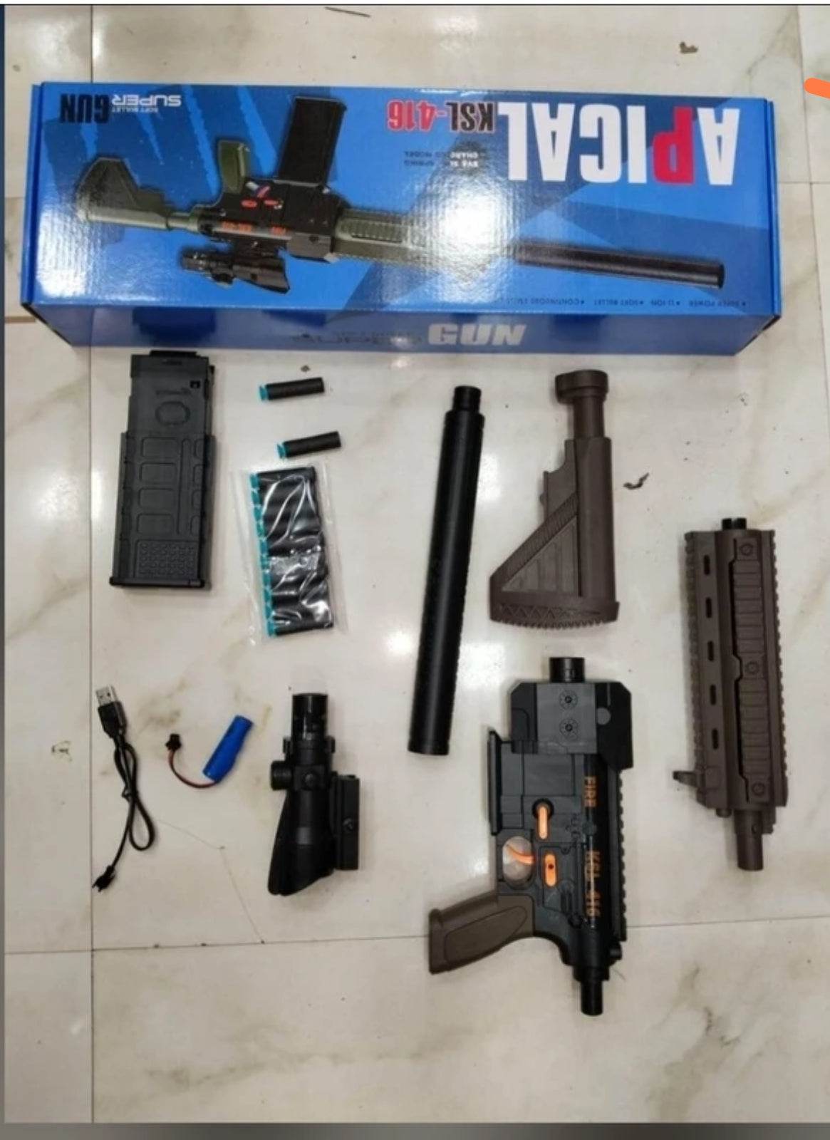 Black toy gun set with accessories for ages 6 and up, designed for imaginative play with realistic details