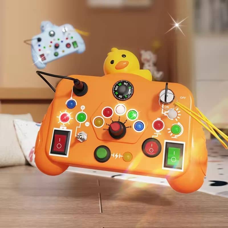 Bright orange toy montessori controller with buttons and a duck for toddlers
