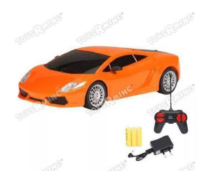 Orange remote control racing car toy with controller, rechargeable batteries, and charger from T-Rex the toyland Sitamarhi