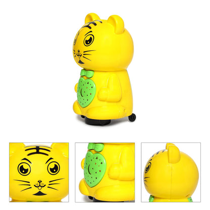 Toyzone yellow musical battery operated bump and go toy in the shape of a tiger with green bowtie and heart